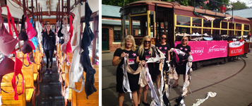 A tram covered in bras to raise awareness for Octobra